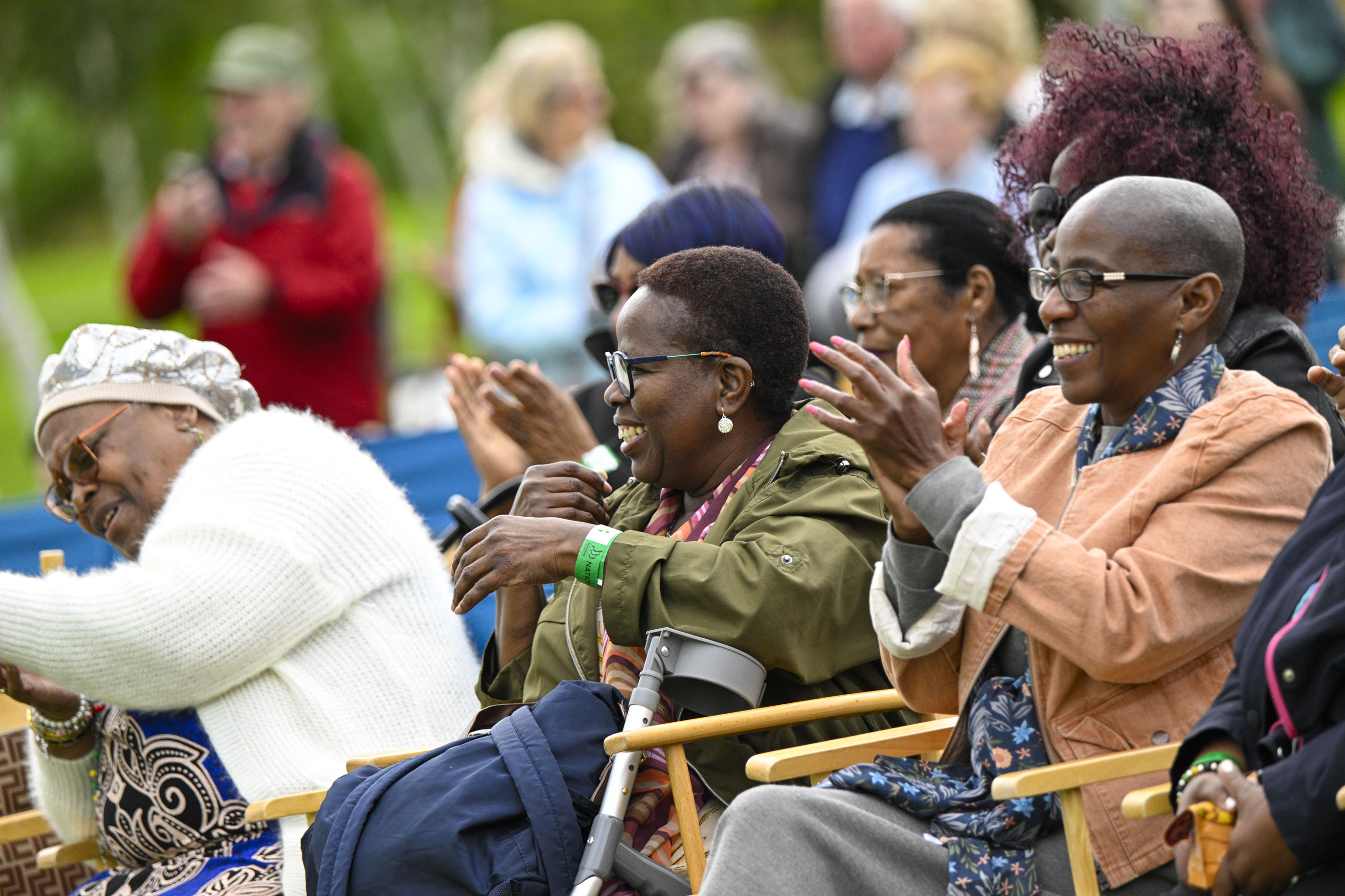 The crowd cheer performers on the stage at Carnival Windrush