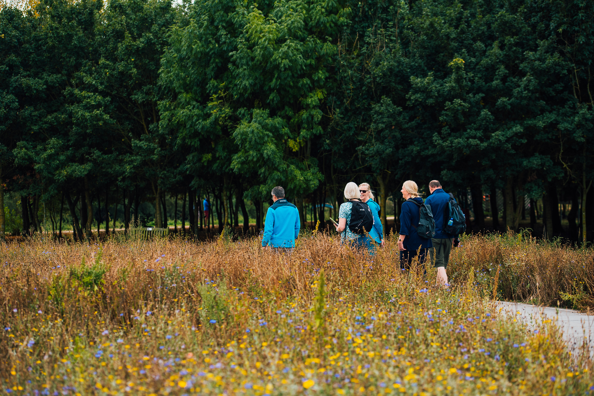 Group walking through Police Memorial Wildflowers