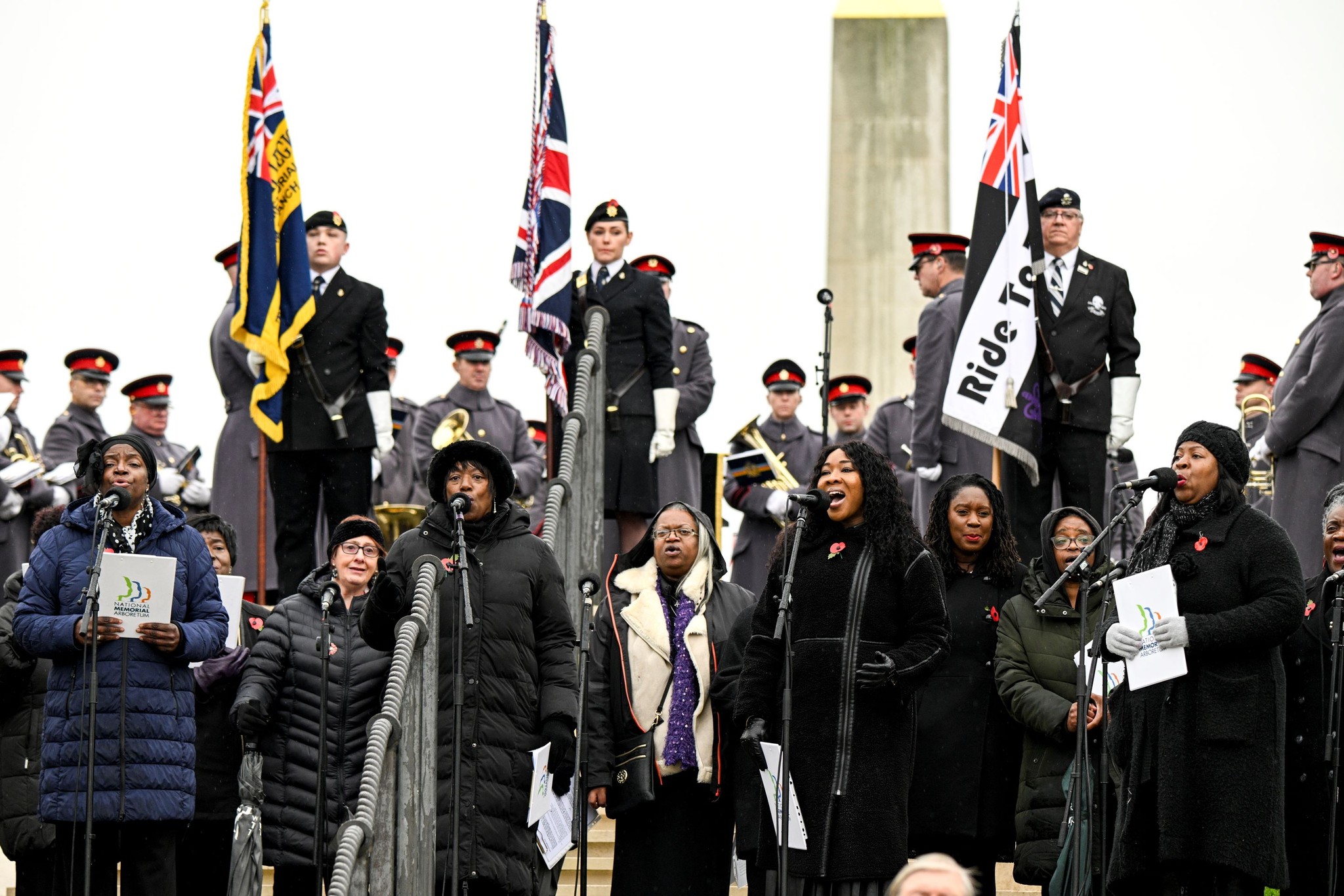 Black Voices and The Reggae Choir singing as part of the Remembrance Sunday Service
