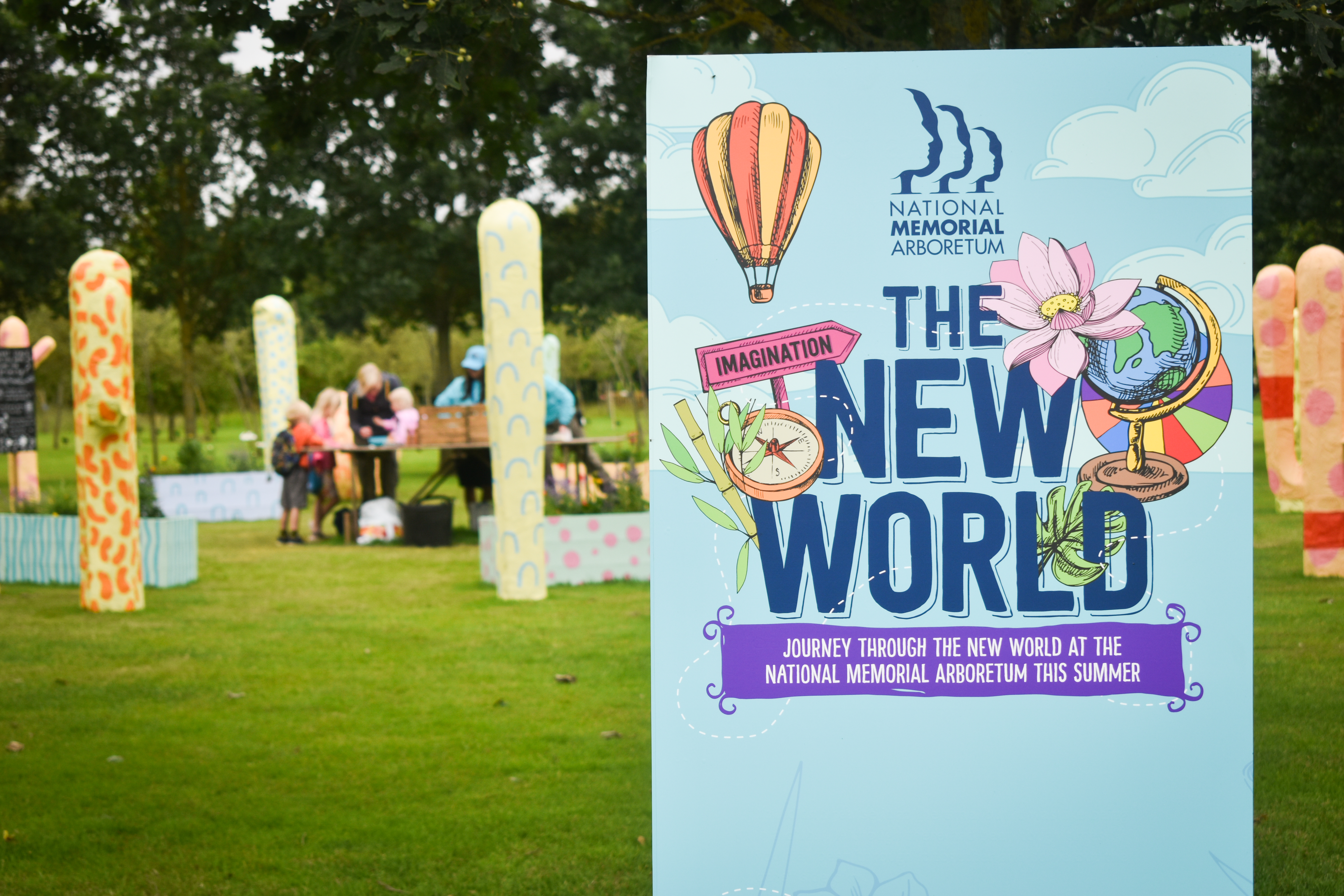 Image showing a picture of The Dream Garden and families planting their own seeds within the garden