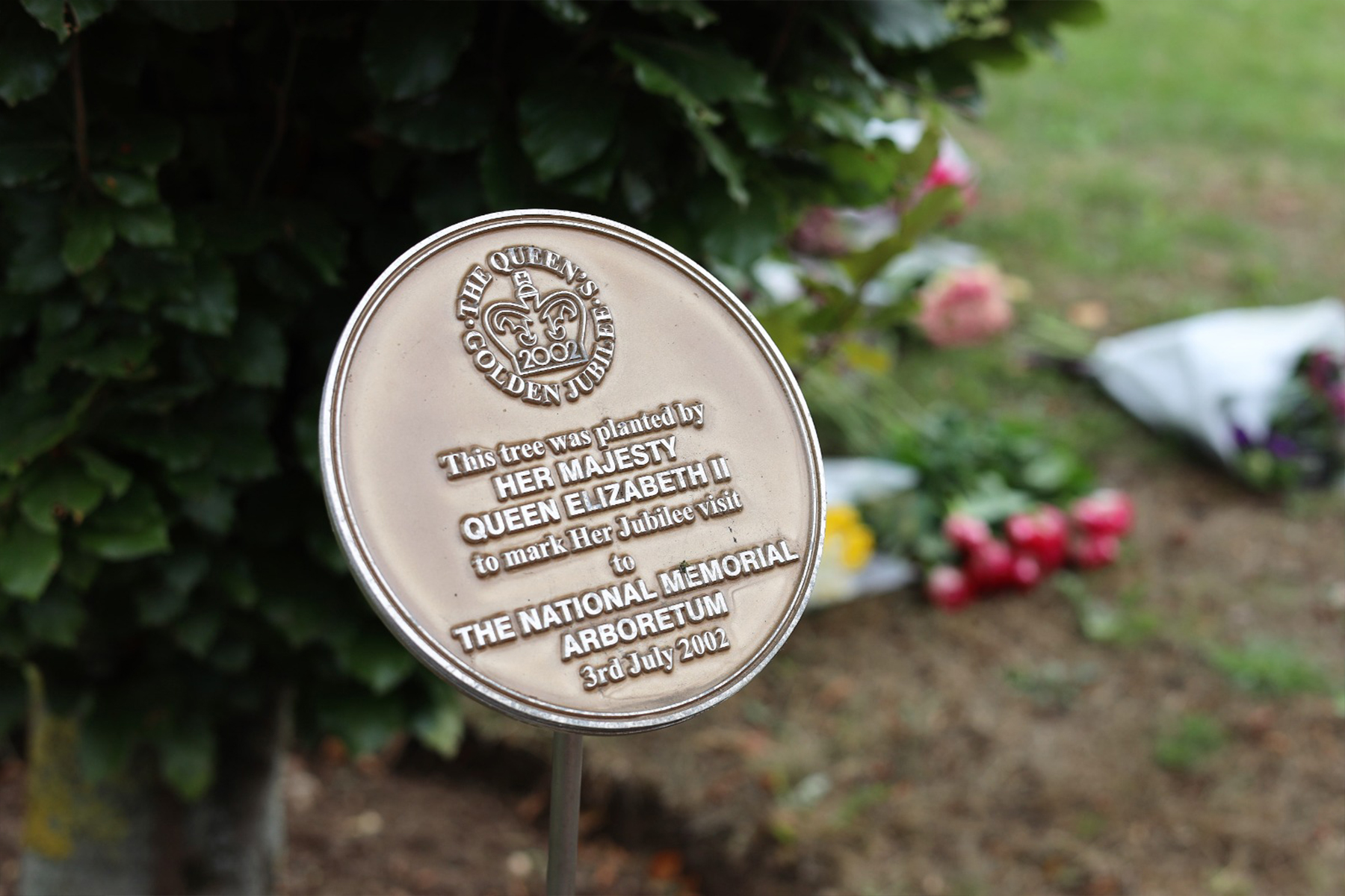 Plaque alongside Her Late Majesty's Golden Jubilee Tree at the Arboretum